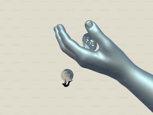 a person's hand reaching for a small object