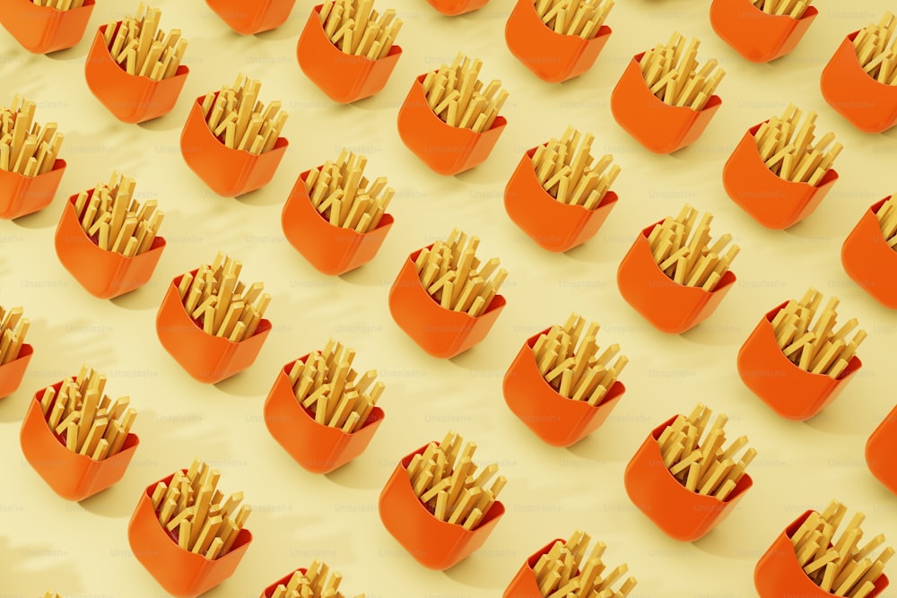 a bunch of french fries sitting in a red container
