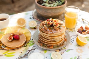 a stack of pancakes sitting on top of a table