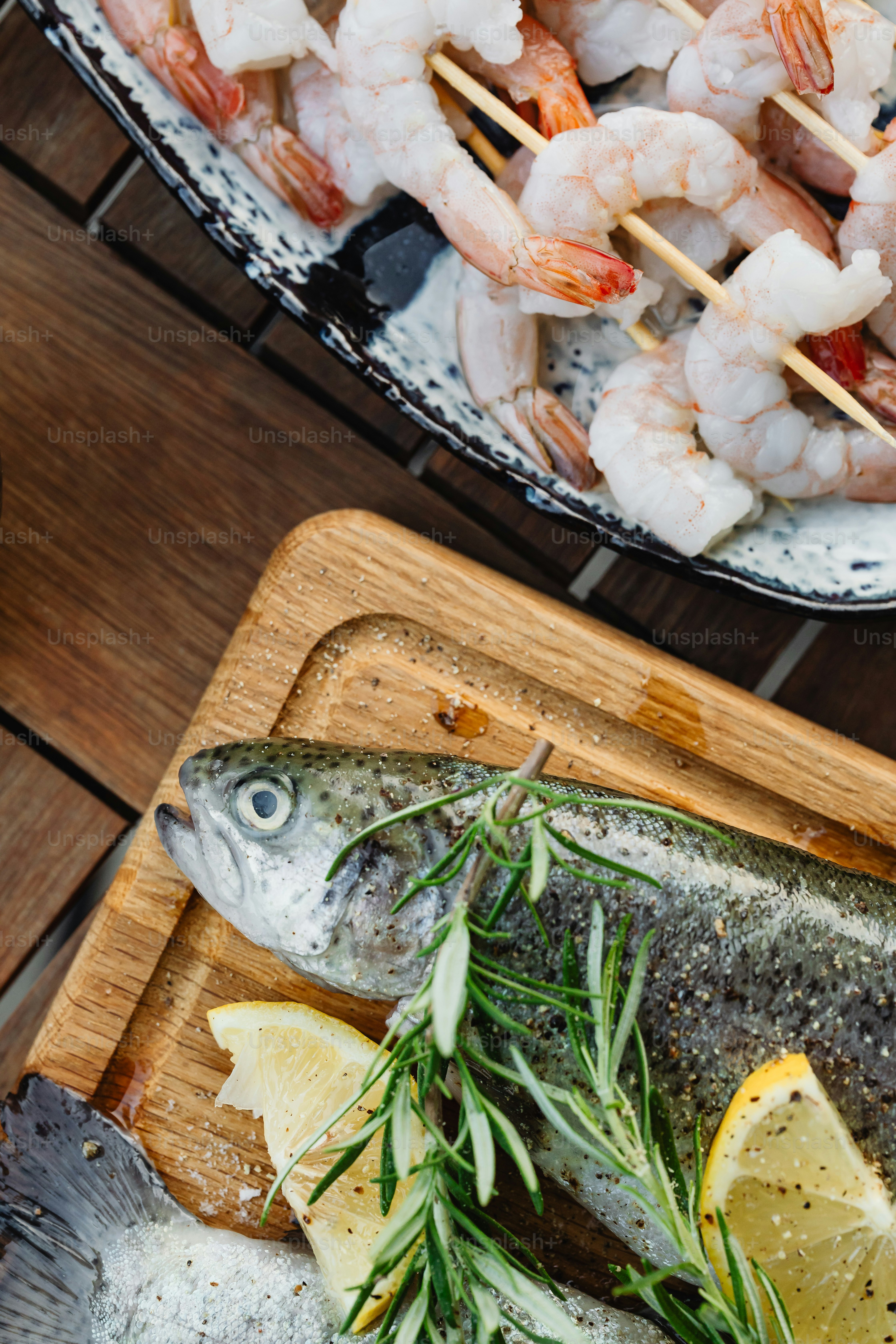 a close up of a fish on a cutting board