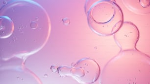 Un primo piano di bolle d'acqua su uno sfondo rosa