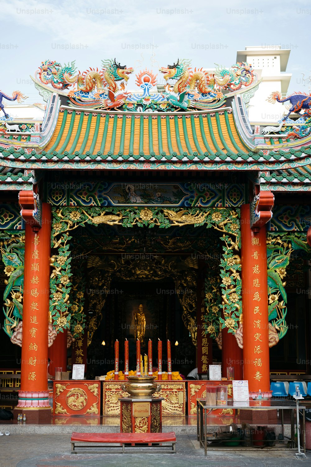 a chinese temple with a shrine in the middle of it
