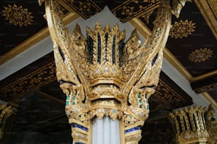 a gold and blue clock in a building