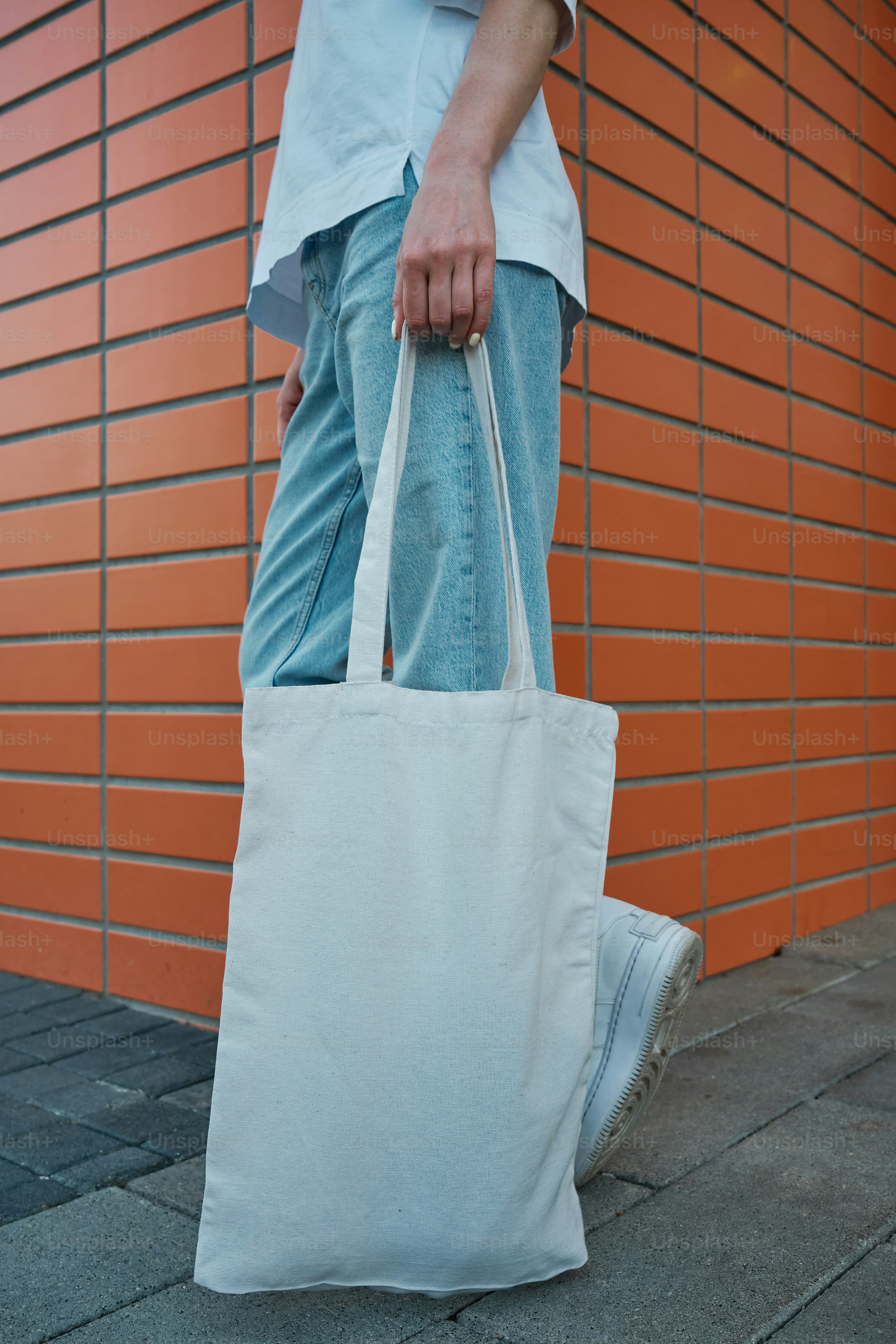 woman showing off her shopper bag