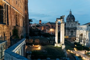 a view of a city at night from the top of a building