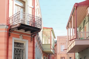 a row of buildings with balconies and a balcony