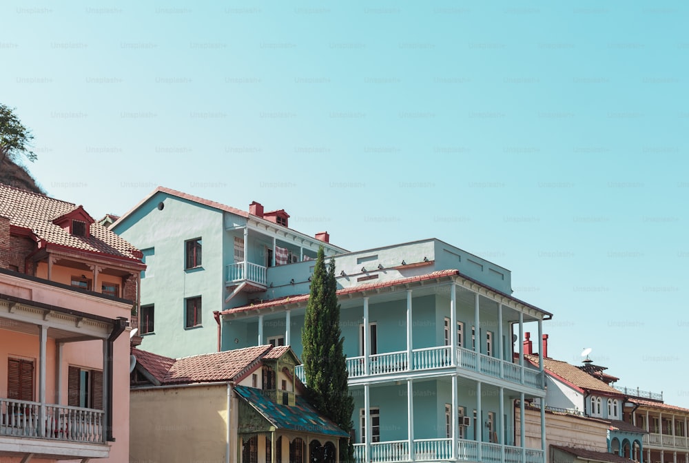 a row of buildings with balconies and balconies on top of them