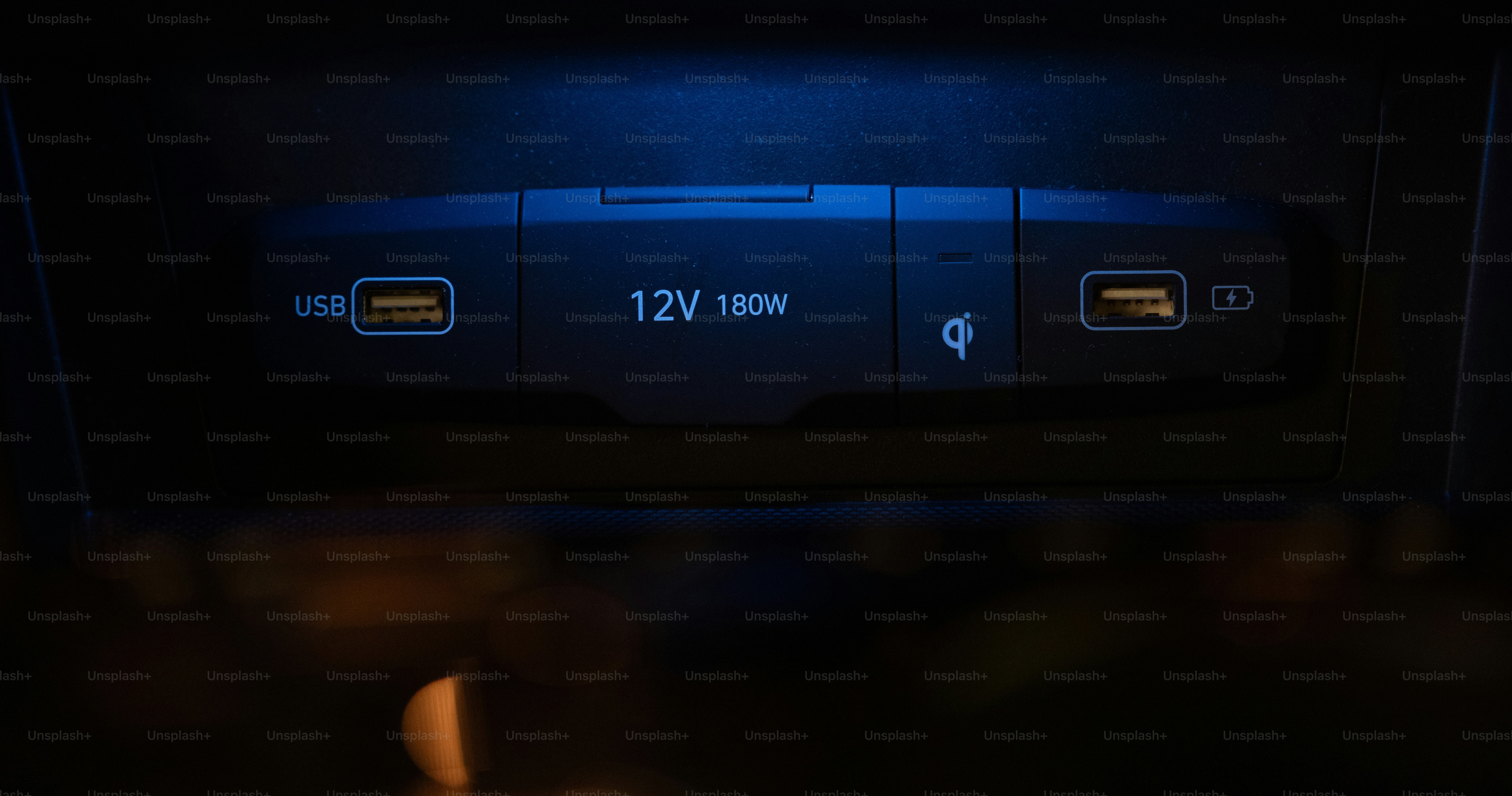 a close up of a blue light in a car