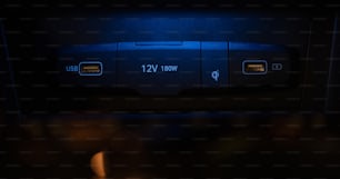 a close up of a blue light in a car