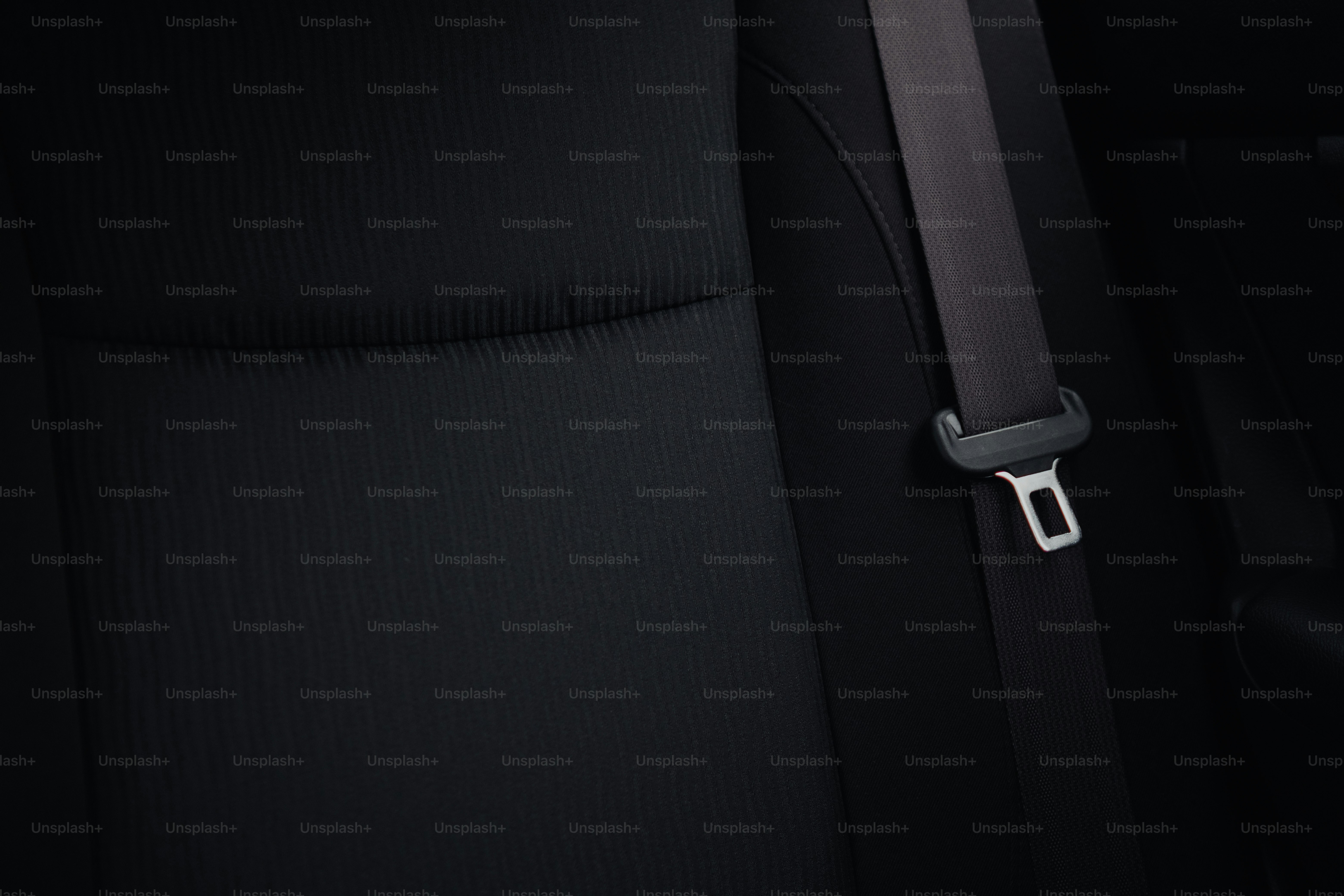 a close up of a seat belt on a car