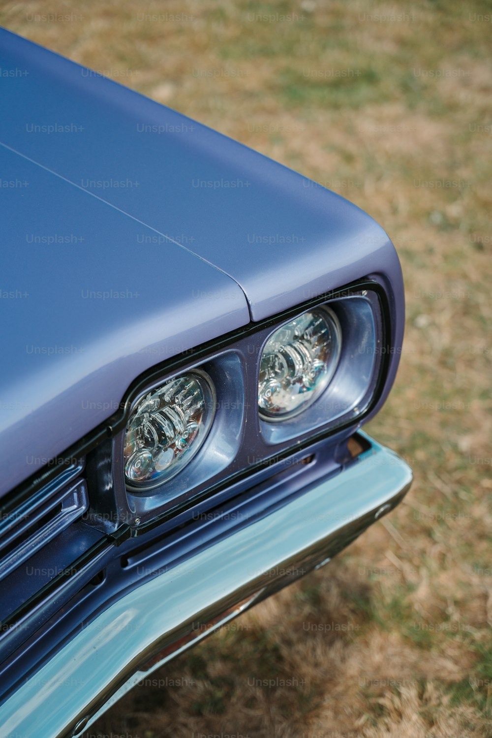 a close up of the headlights of a car