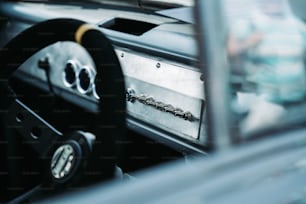 a close up of a steering wheel on a car