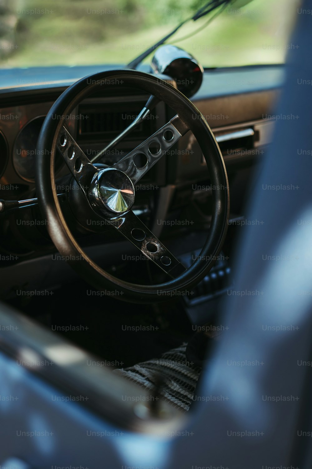 a steering wheel and dashboard of a car