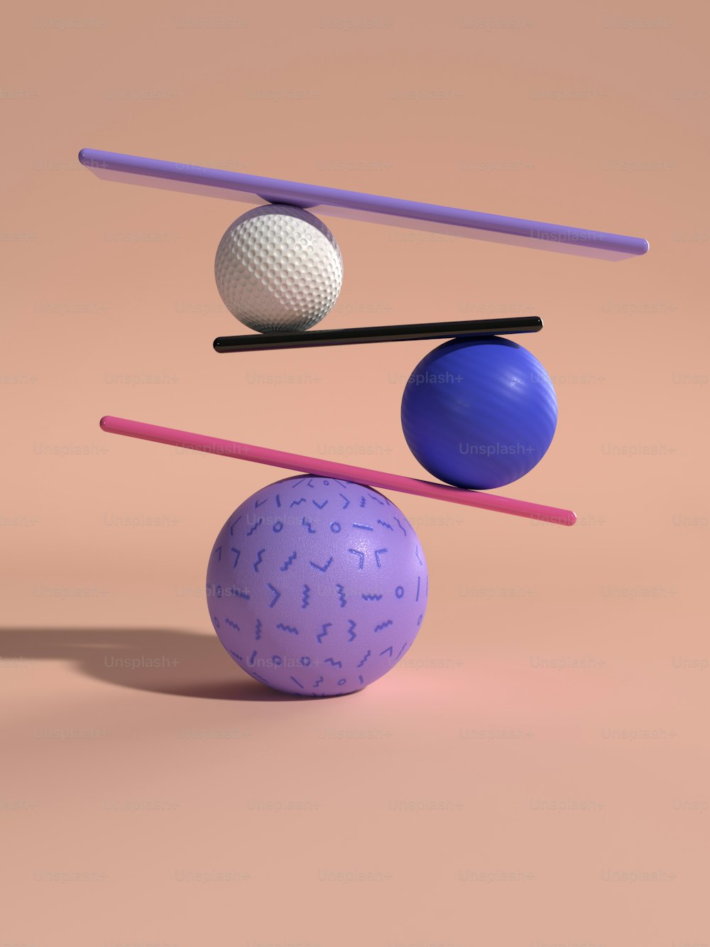 a group of three balls sitting on top of each other