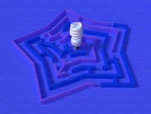 a spiral shaped object in the middle of a maze