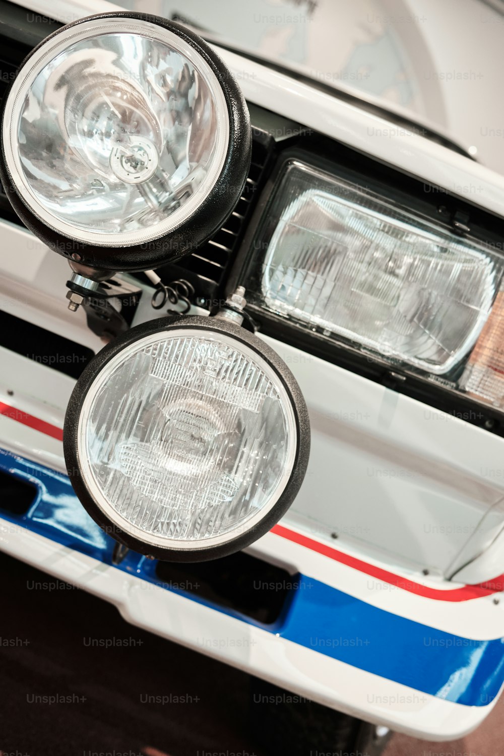 a close up of a car headlight on a vehicle