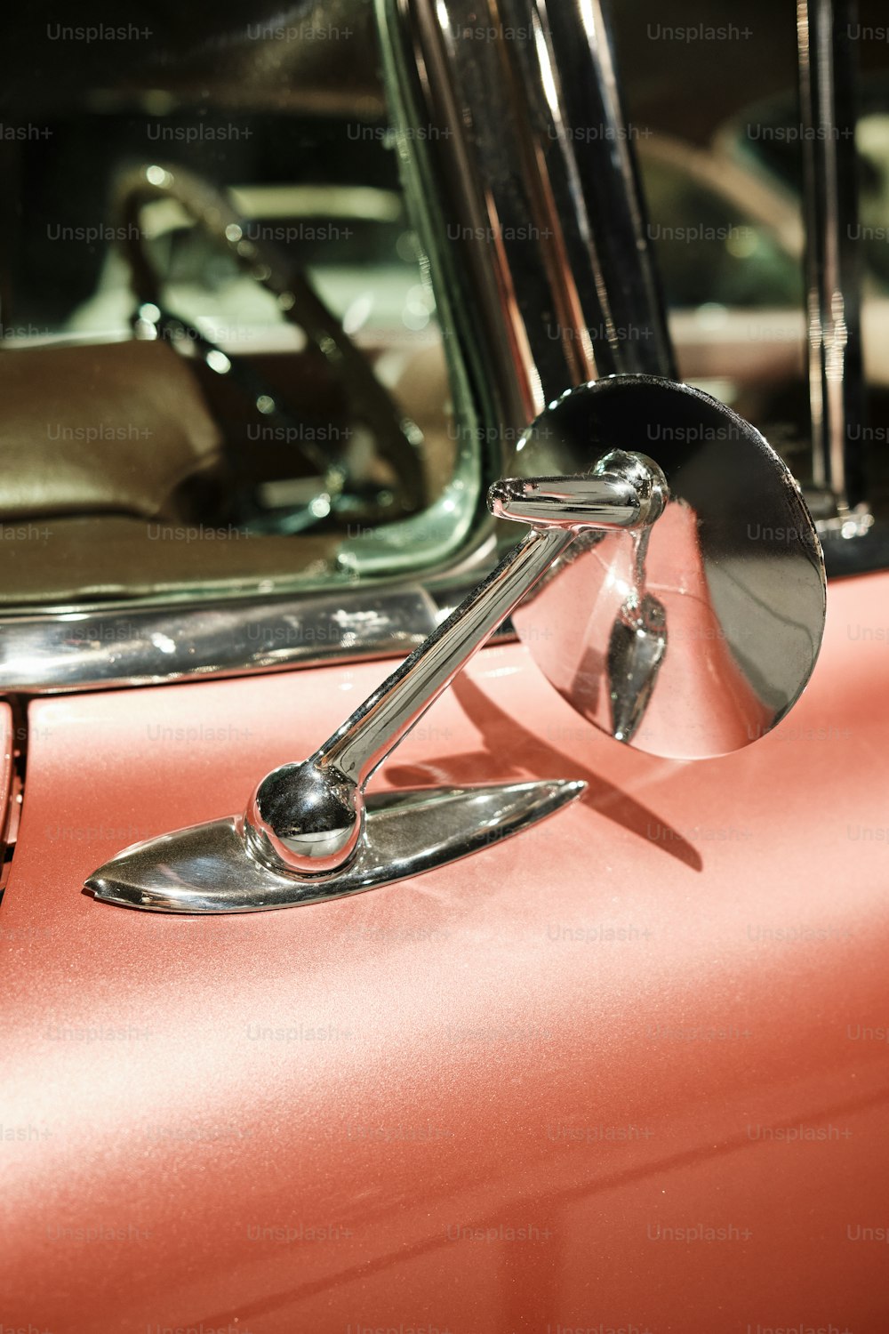 a close up of a mirror on a car