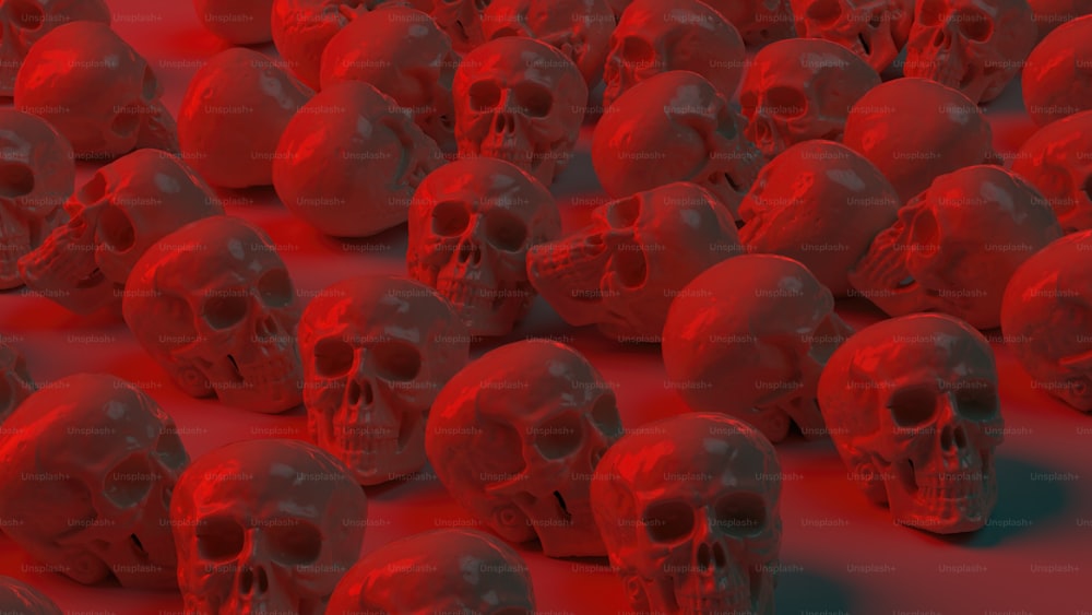 a large group of red skulls sitting on top of each other