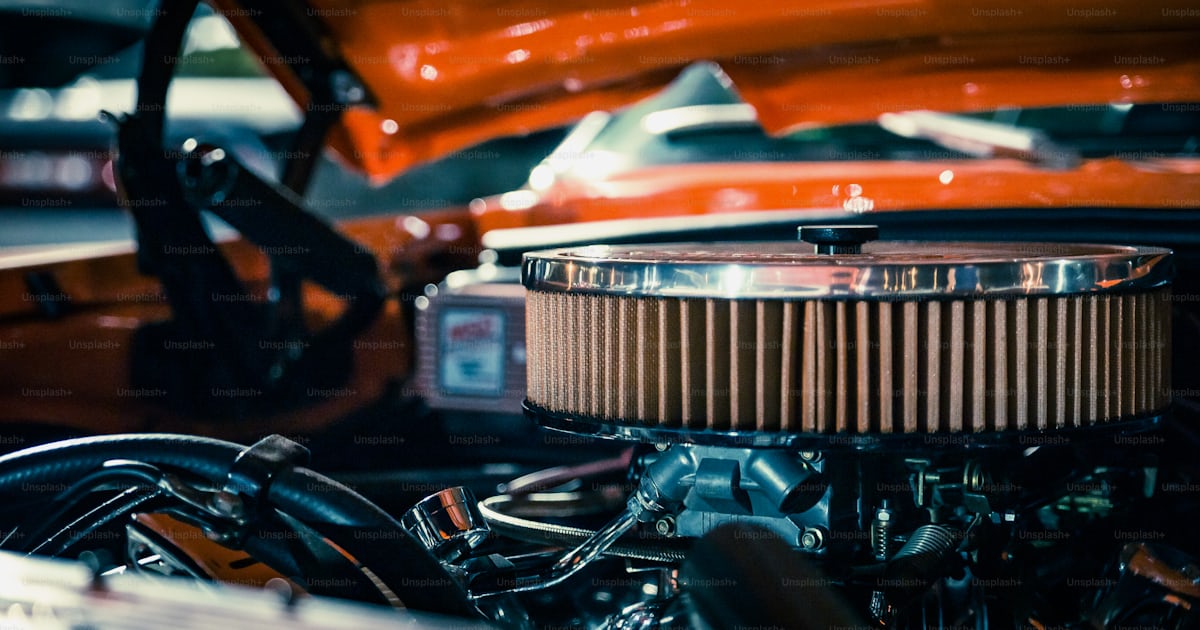 A close up of the engine of a car photo – Car Image on Unsplash