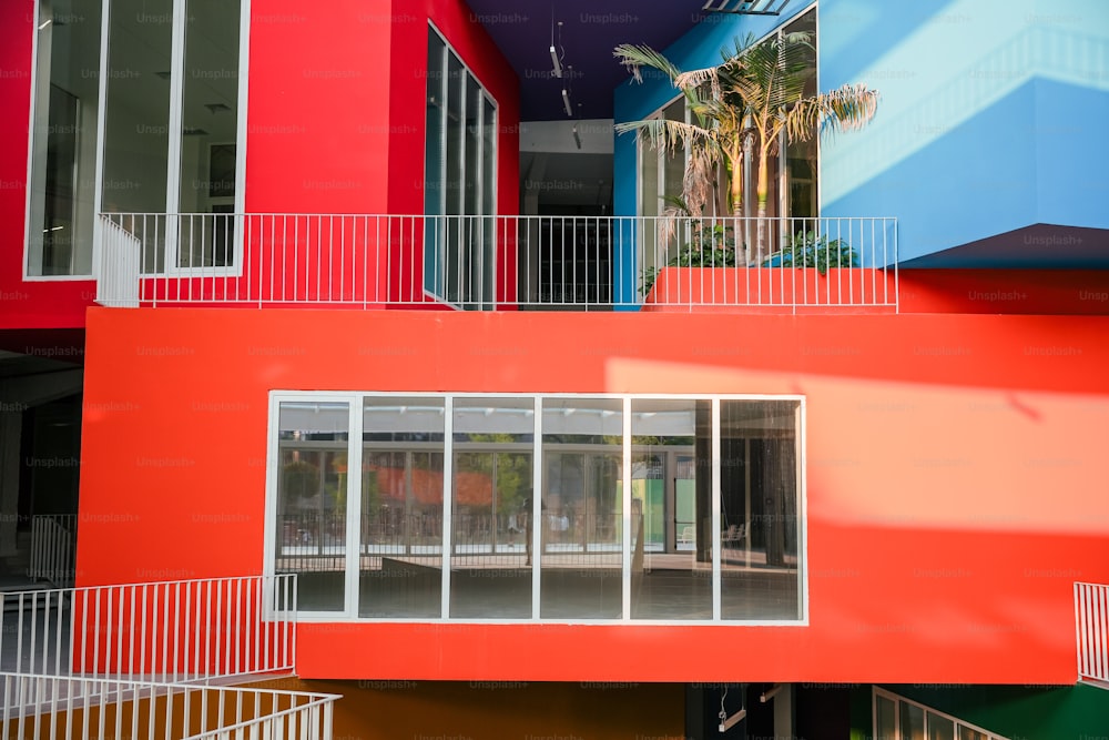 a multicolored building with a balcony and balconies