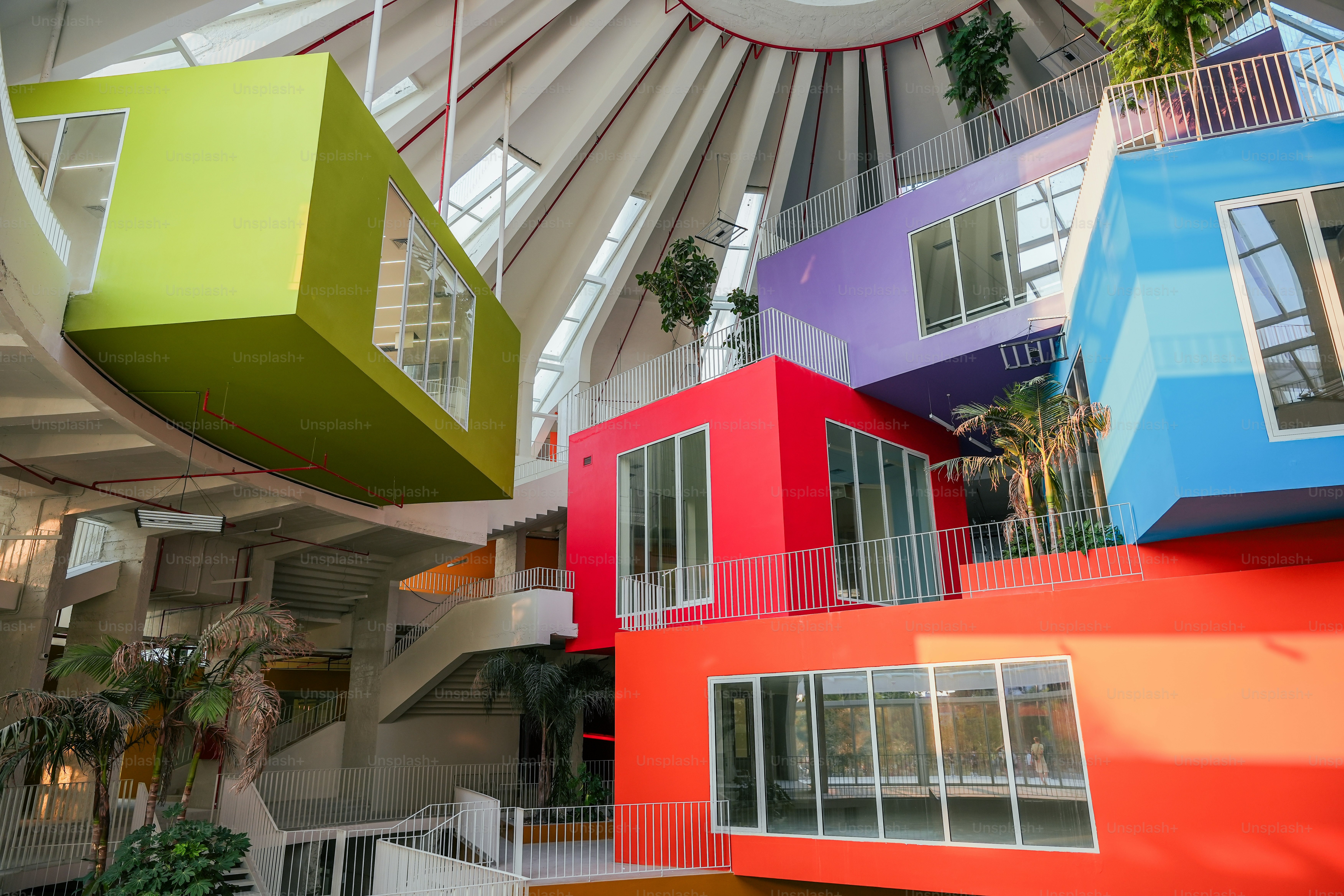 A multicolored building with a staircase leading up to it photo ...