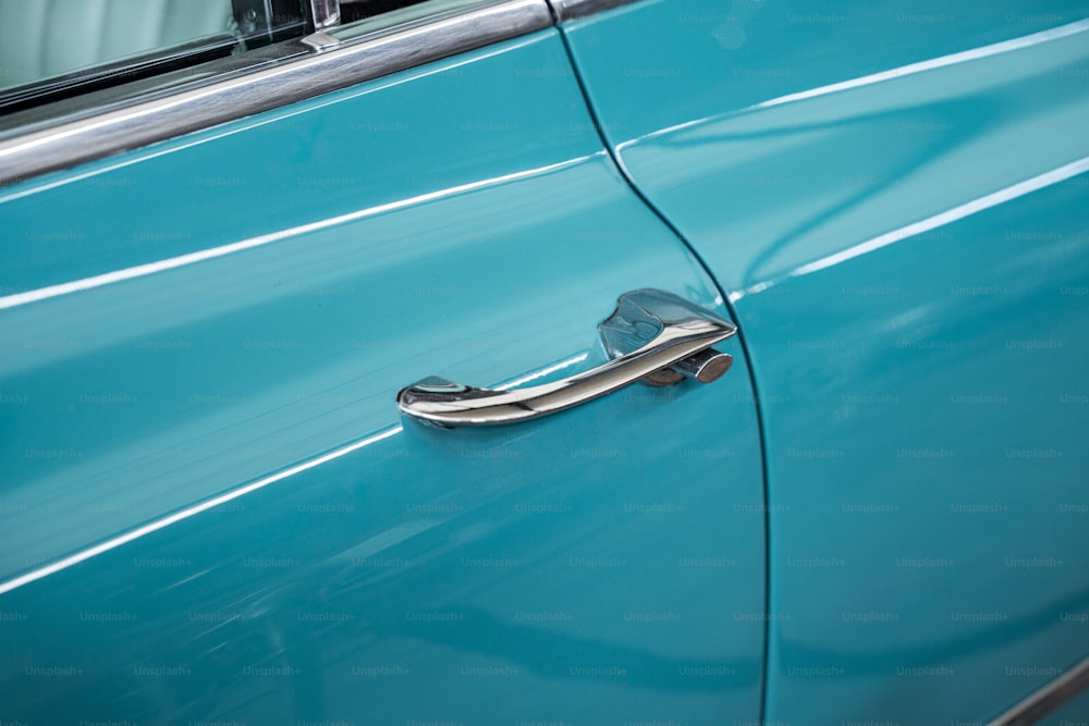 a close up of a door handle on a car