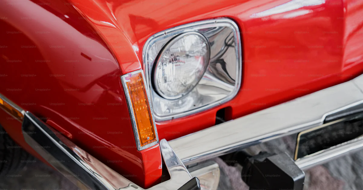 Car Front Rodes A close up of the front end of a red car photo – Car Image on Unsplash