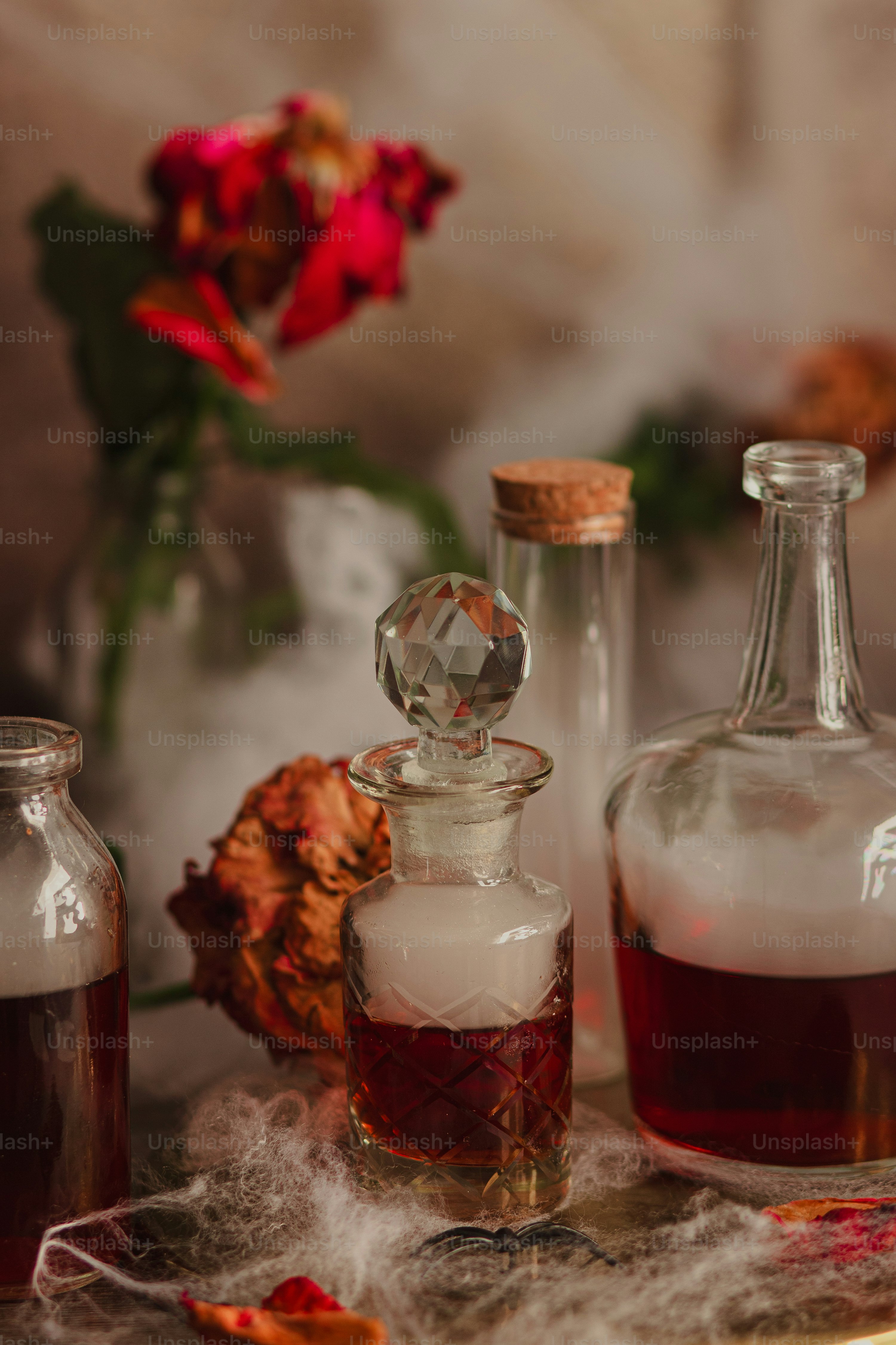 a table topped with bottles filled with liquid
