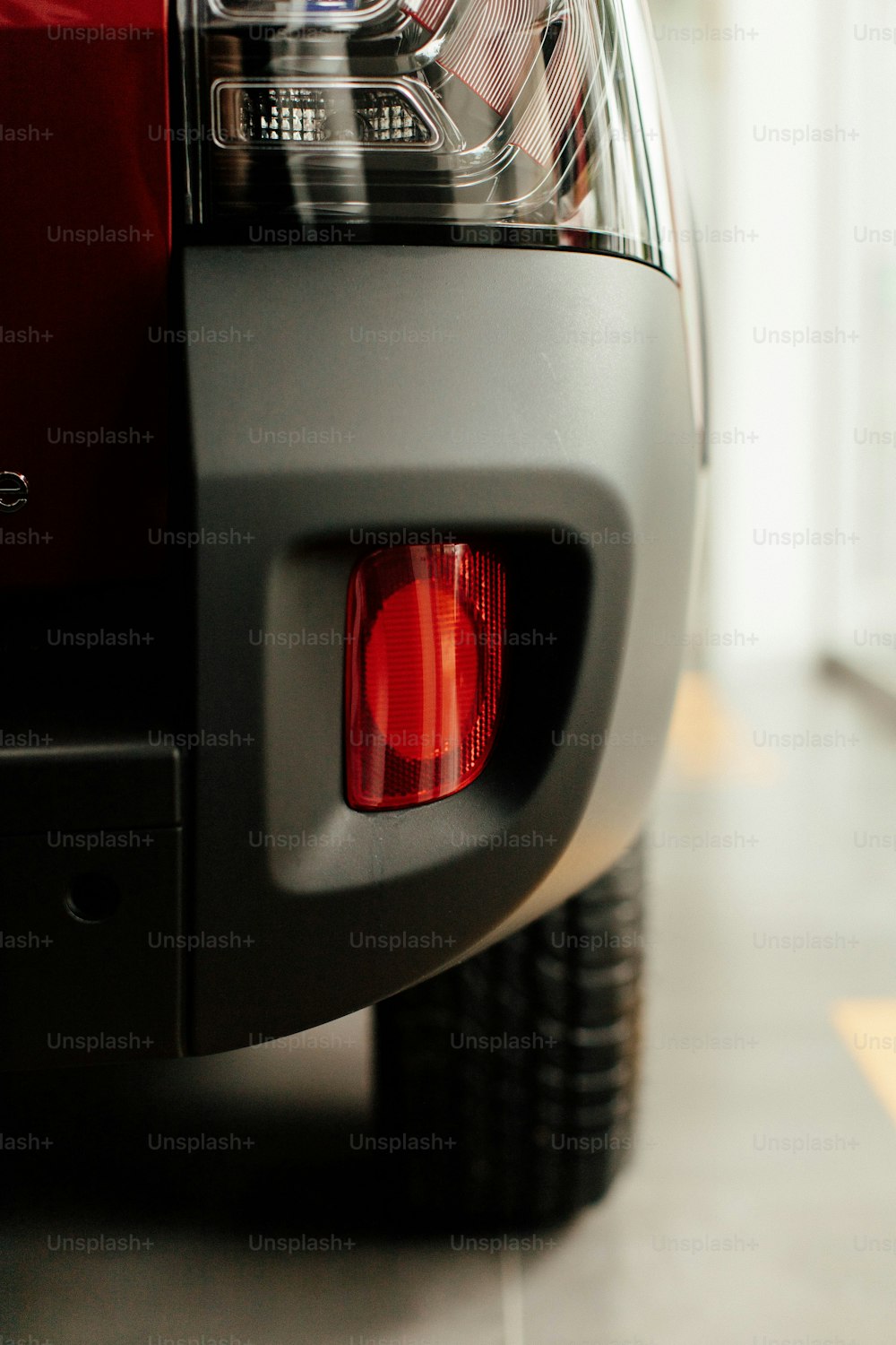 a close up of the tail light of a car