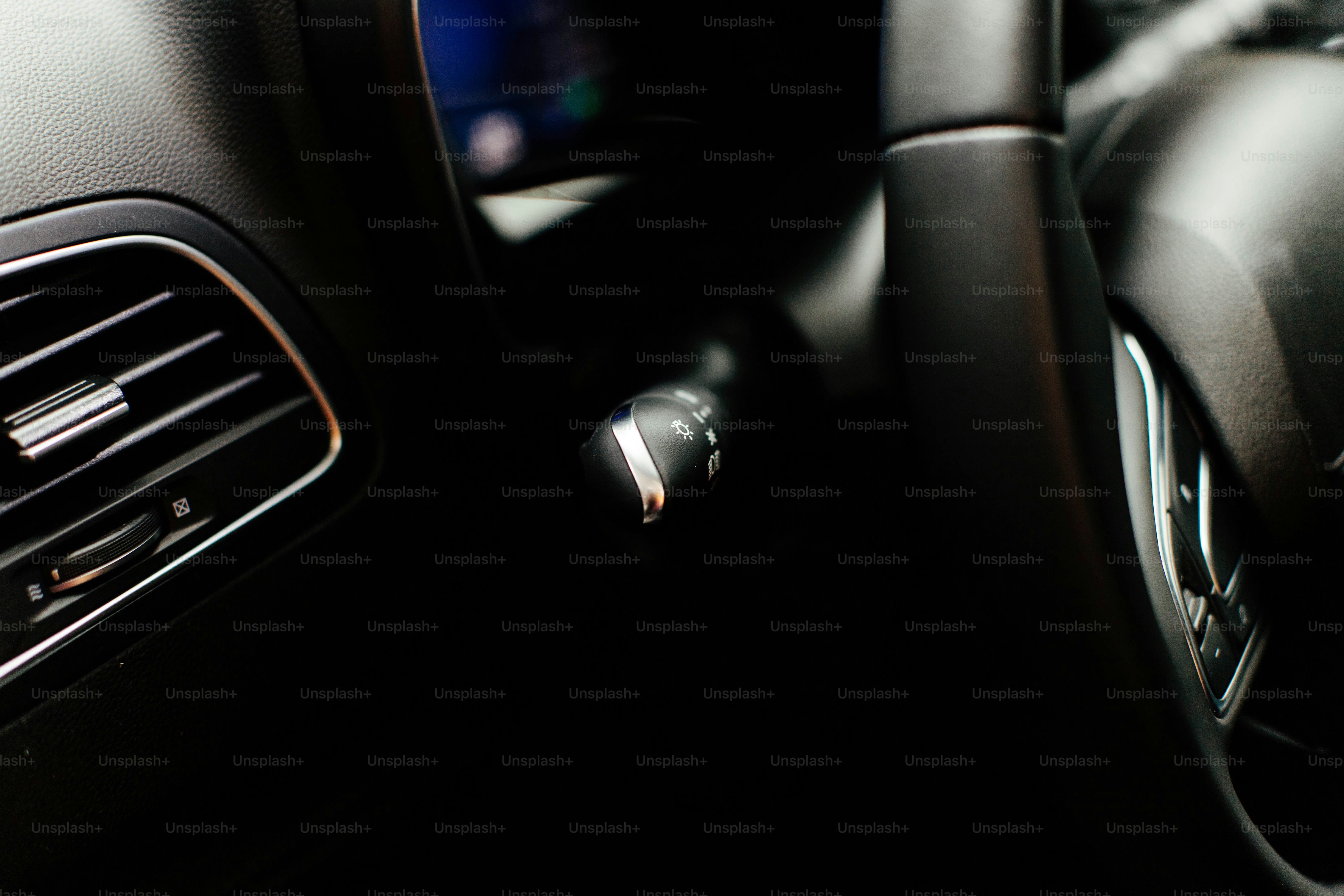 a close up of a car dashboard with a radio