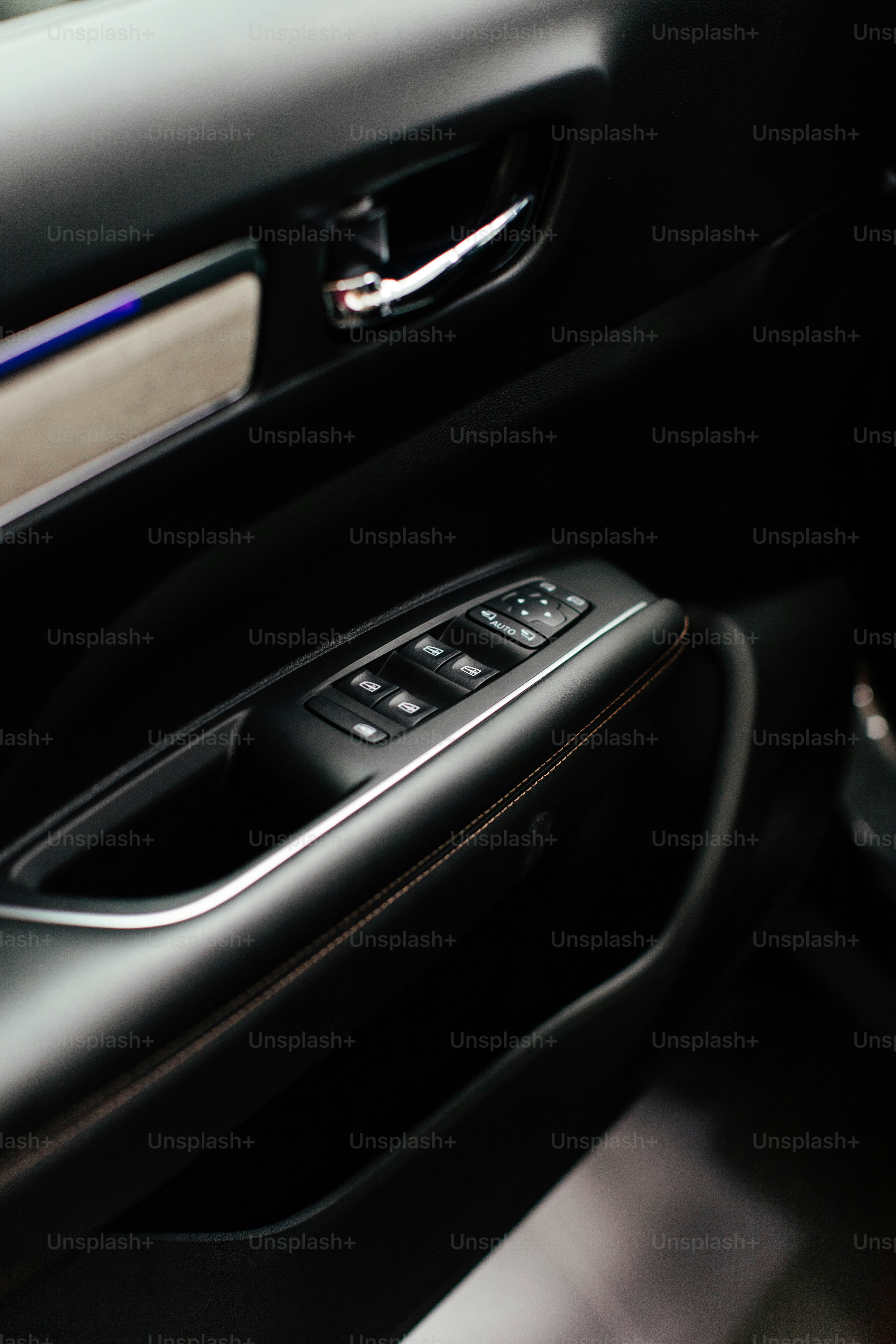 a close up of a door handle on a car