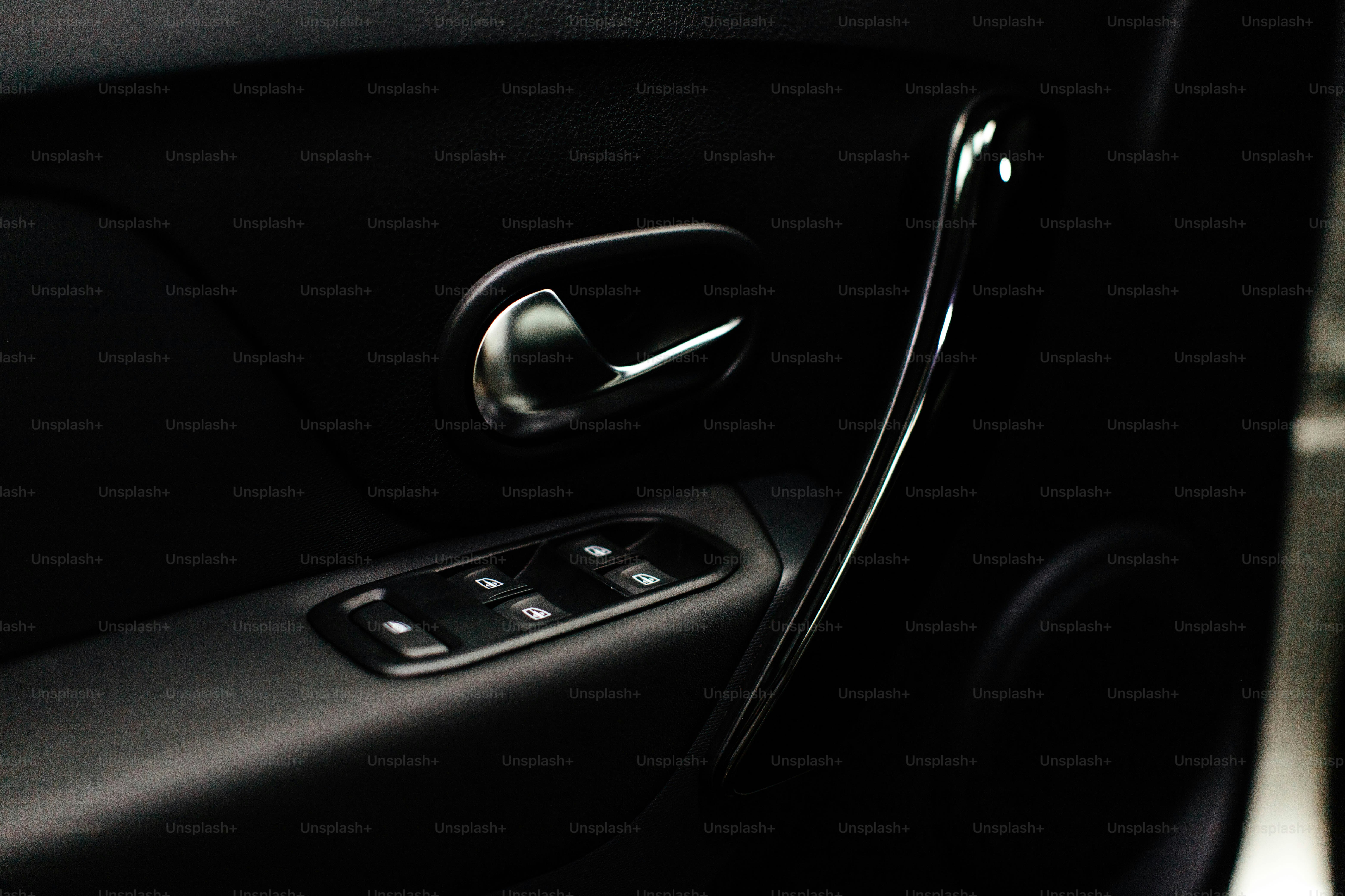 a close up of a door handle on a car