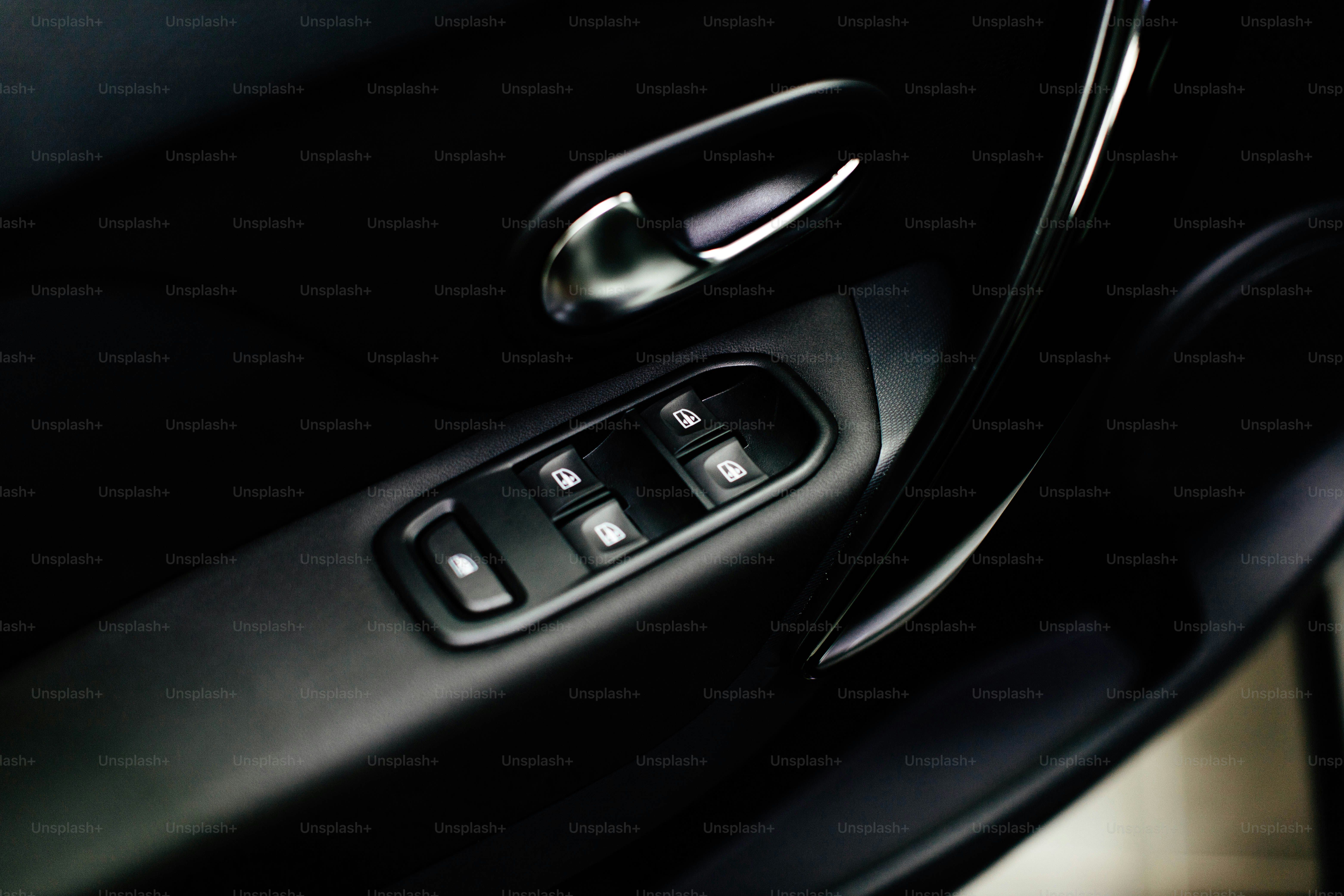 a close up of a door handle on a car