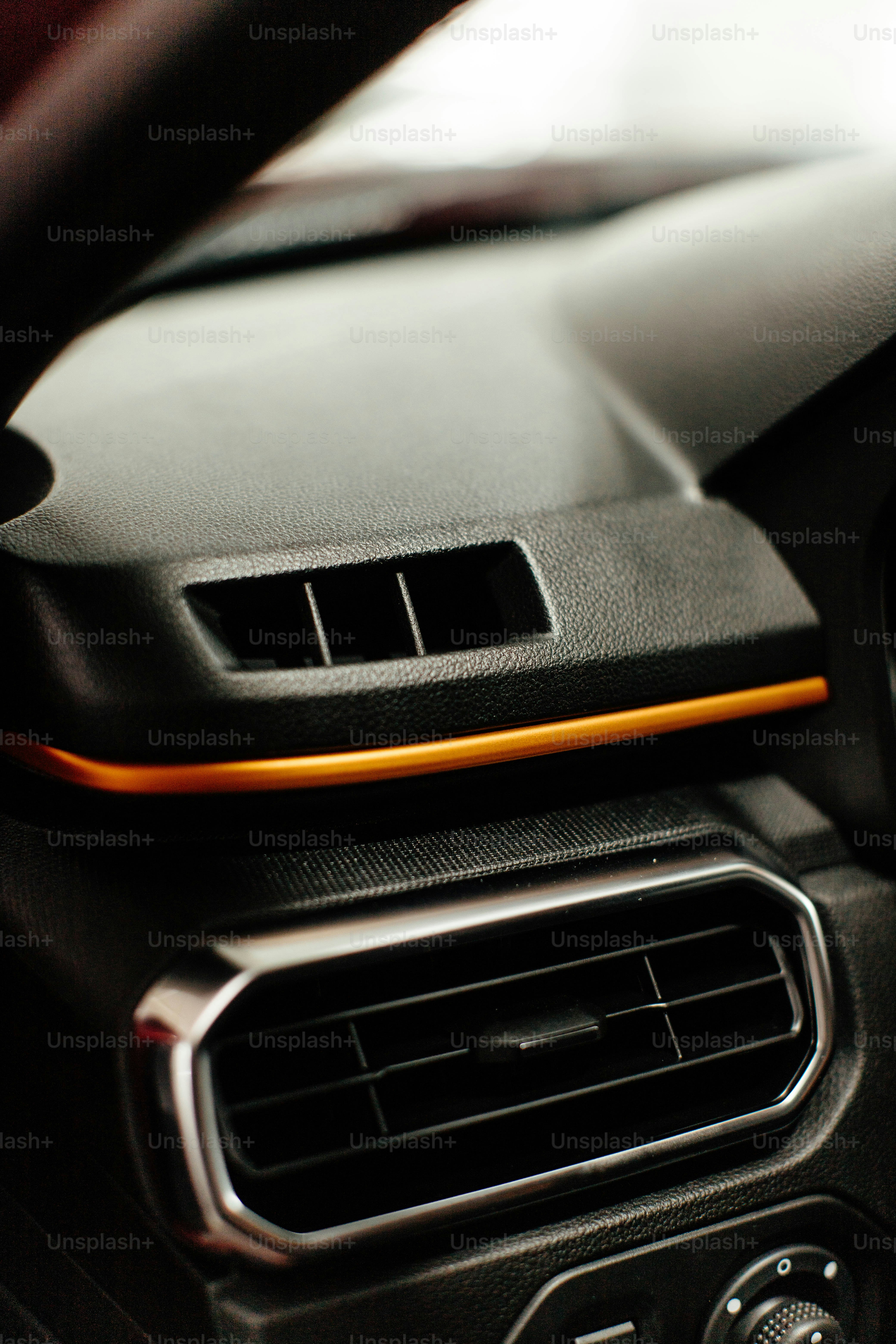 a close up of a car dashboard with a radio
