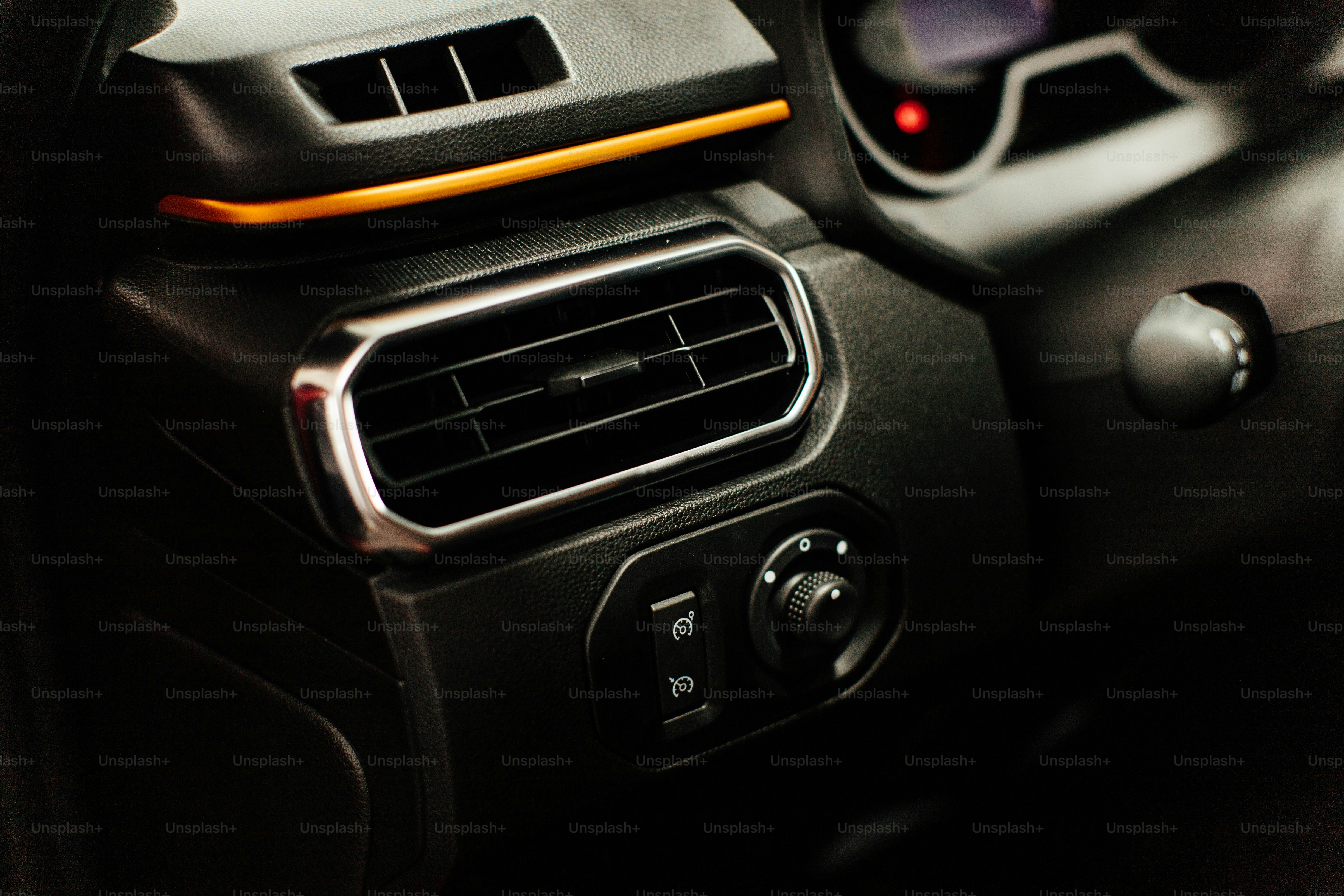 a close up of a car dashboard with a radio
