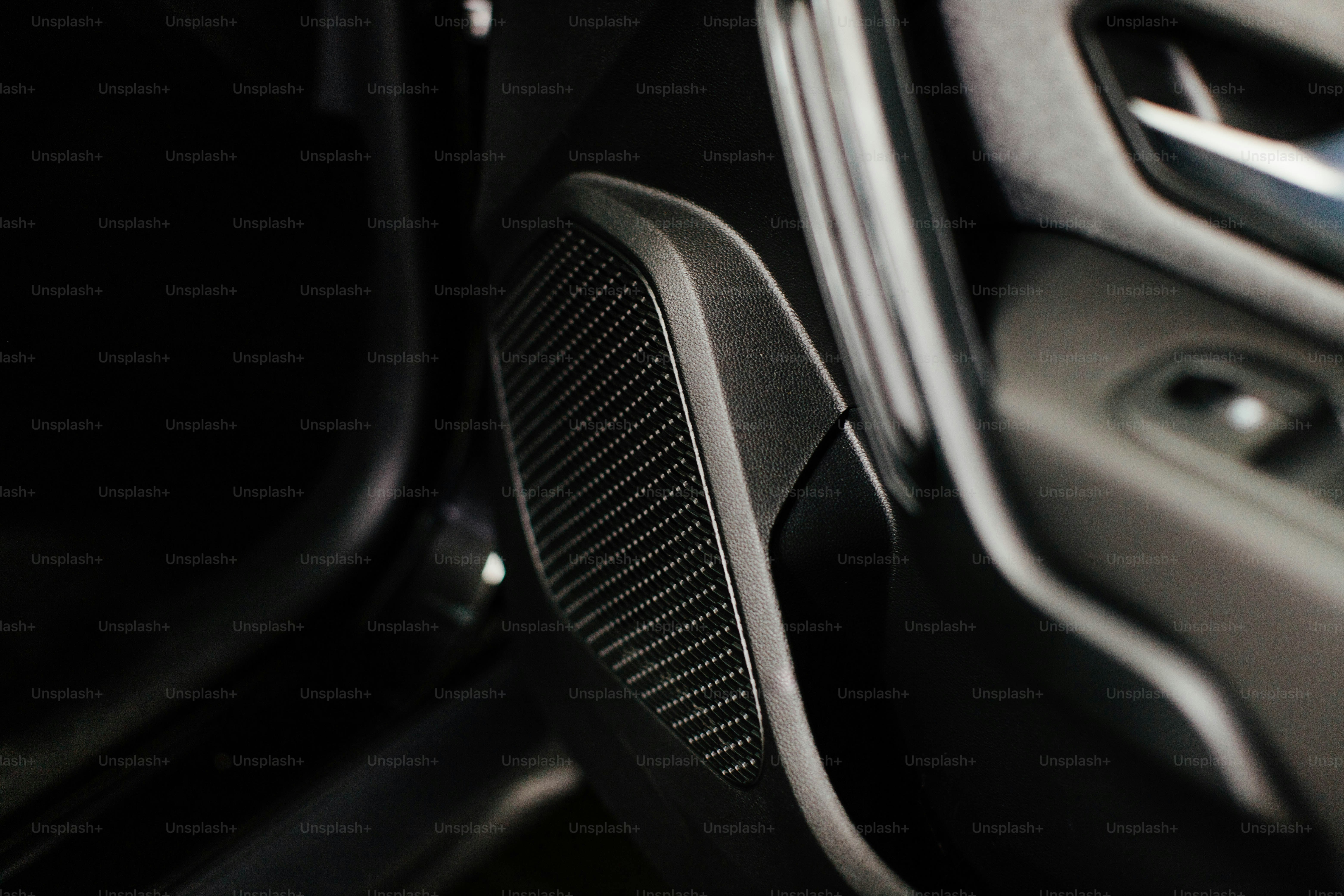 a close up of a door handle in a car