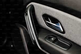 a close up of a door handle in a car