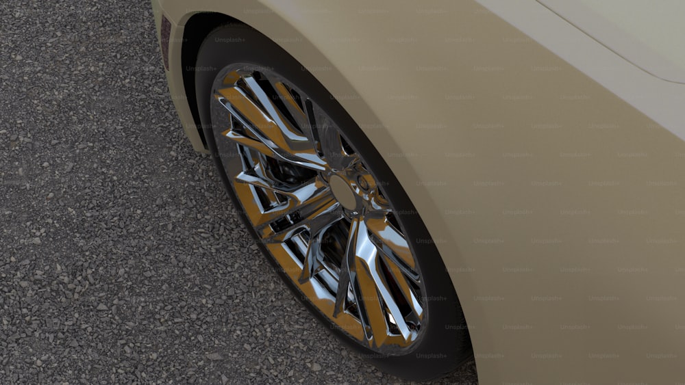 a close up of a car wheel on a road