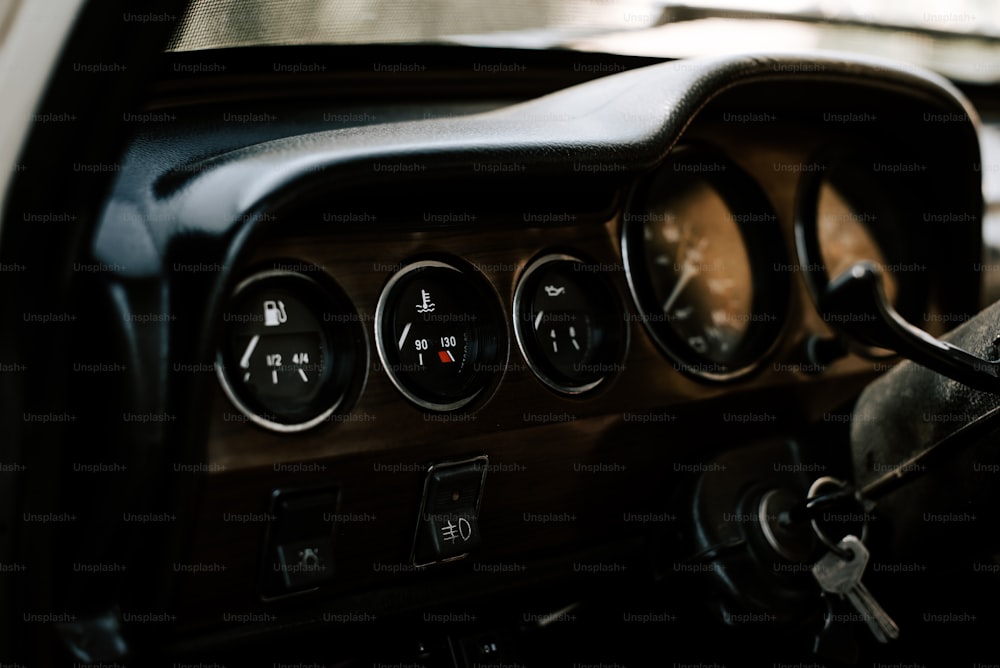 the dashboard of a car with a key in it