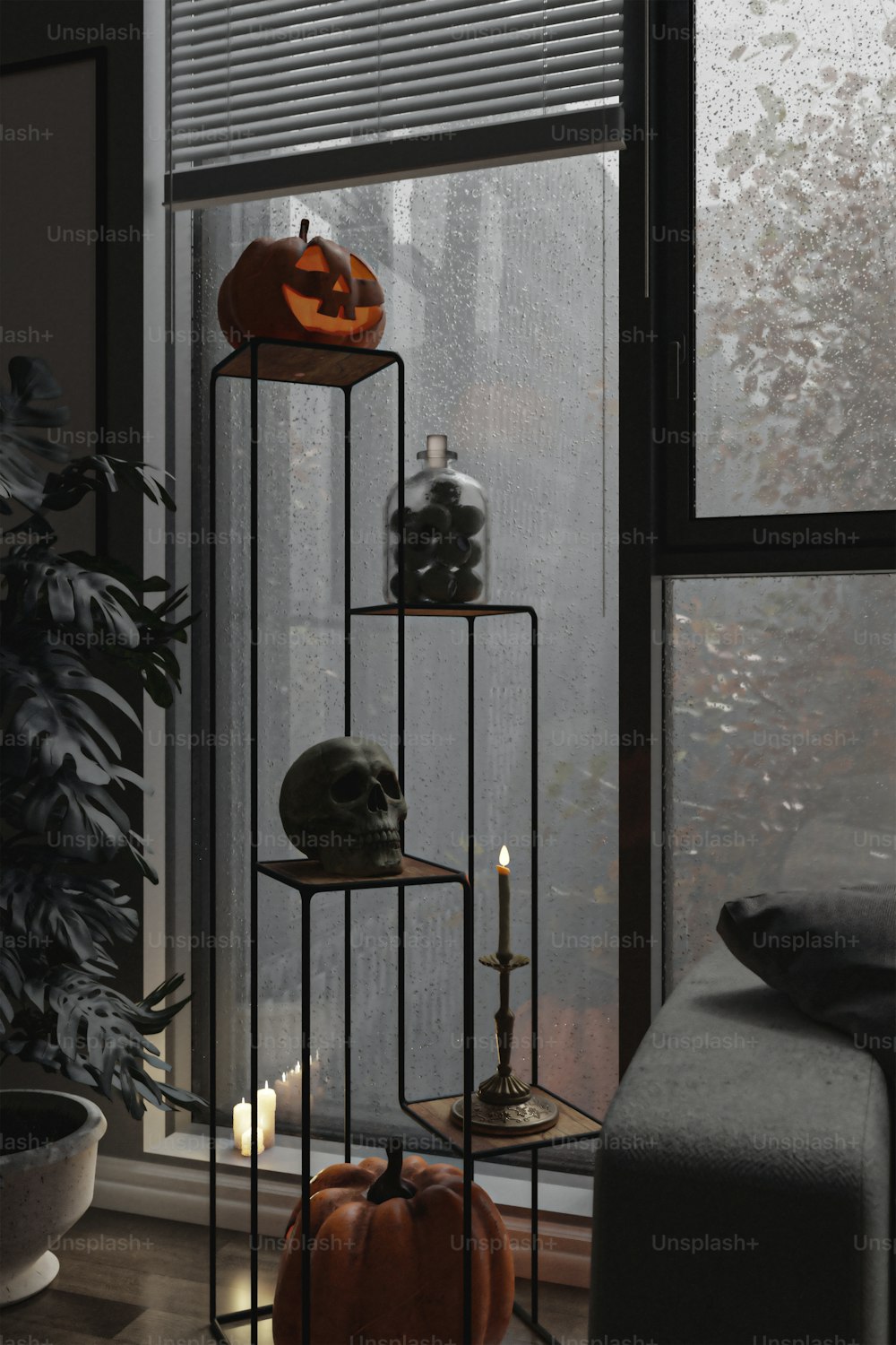 a room with a window and a window sill filled with halloween decorations