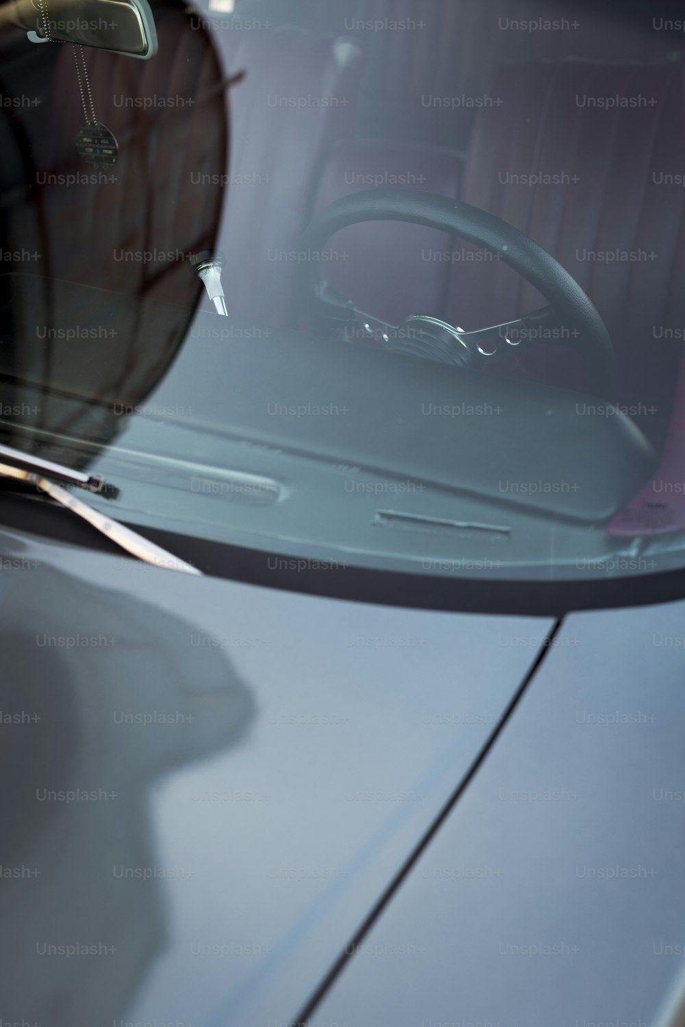 a close up of a car with a steering wheel