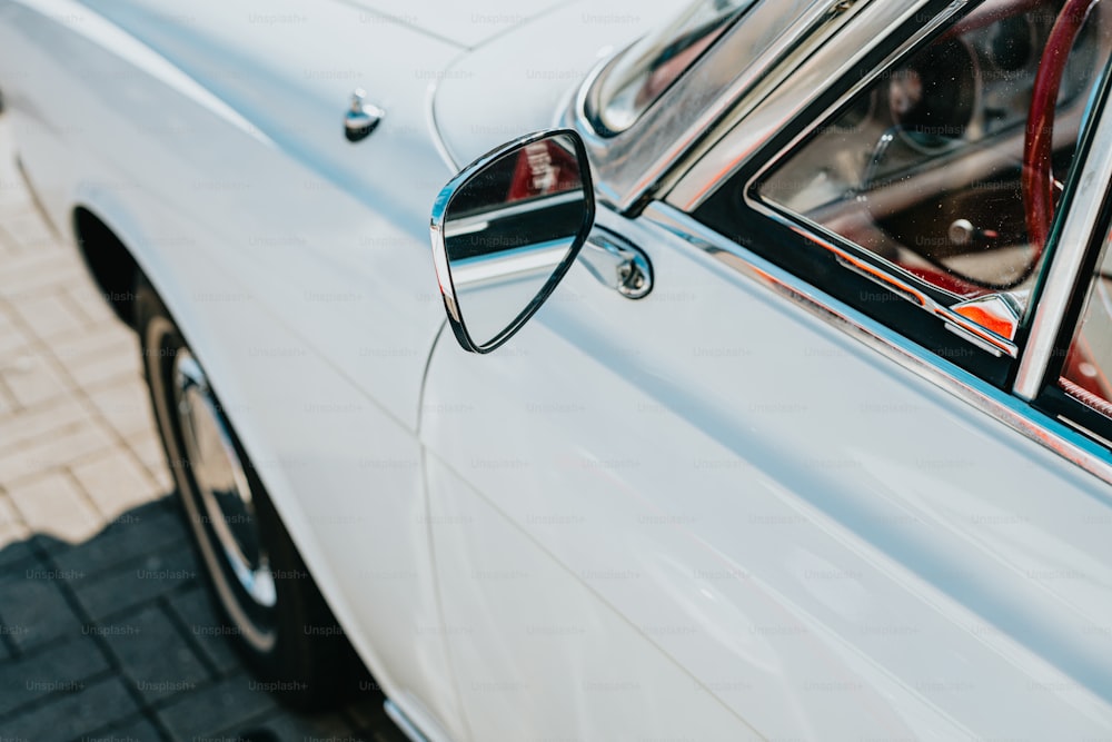 a close up of a car door handle on a car