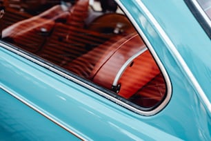 a close up of a car's interior with the door open