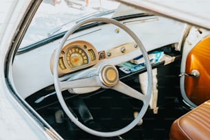 a car with a steering wheel and a dashboard