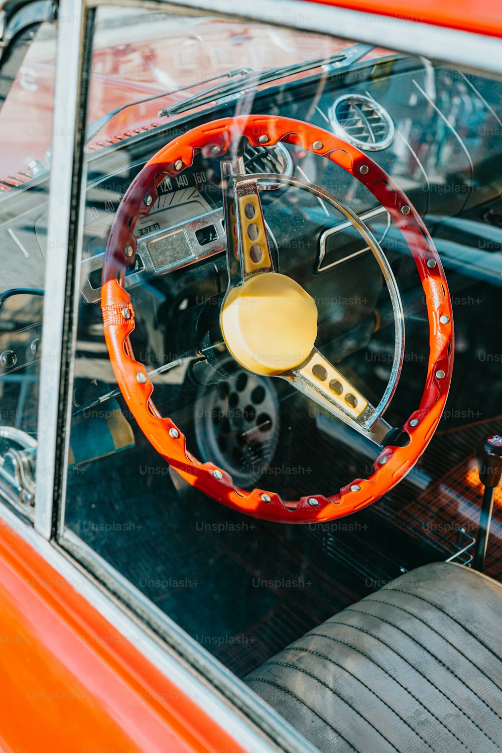 the interior of a car with a steering wheel