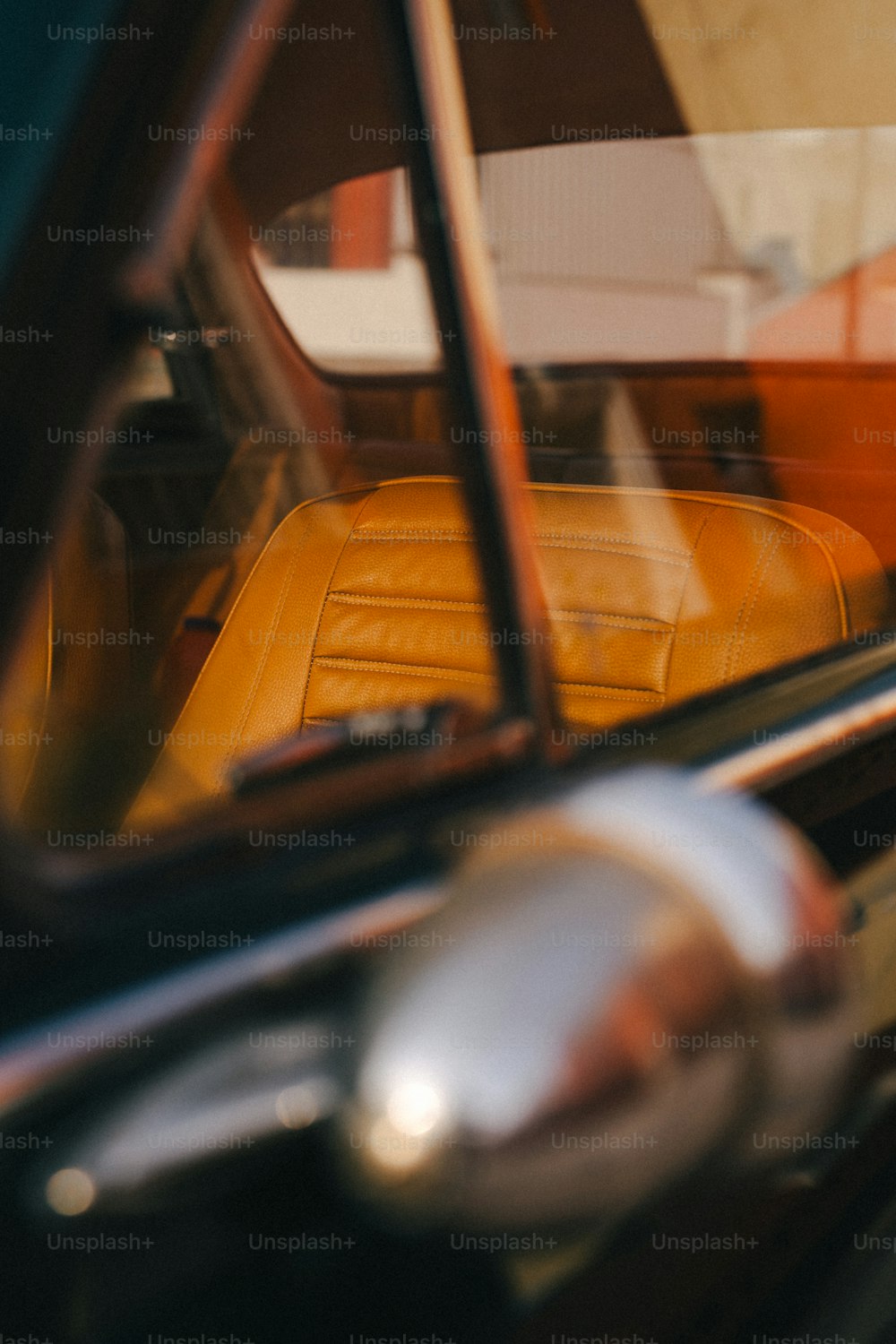 a close up of a car's interior with the door open