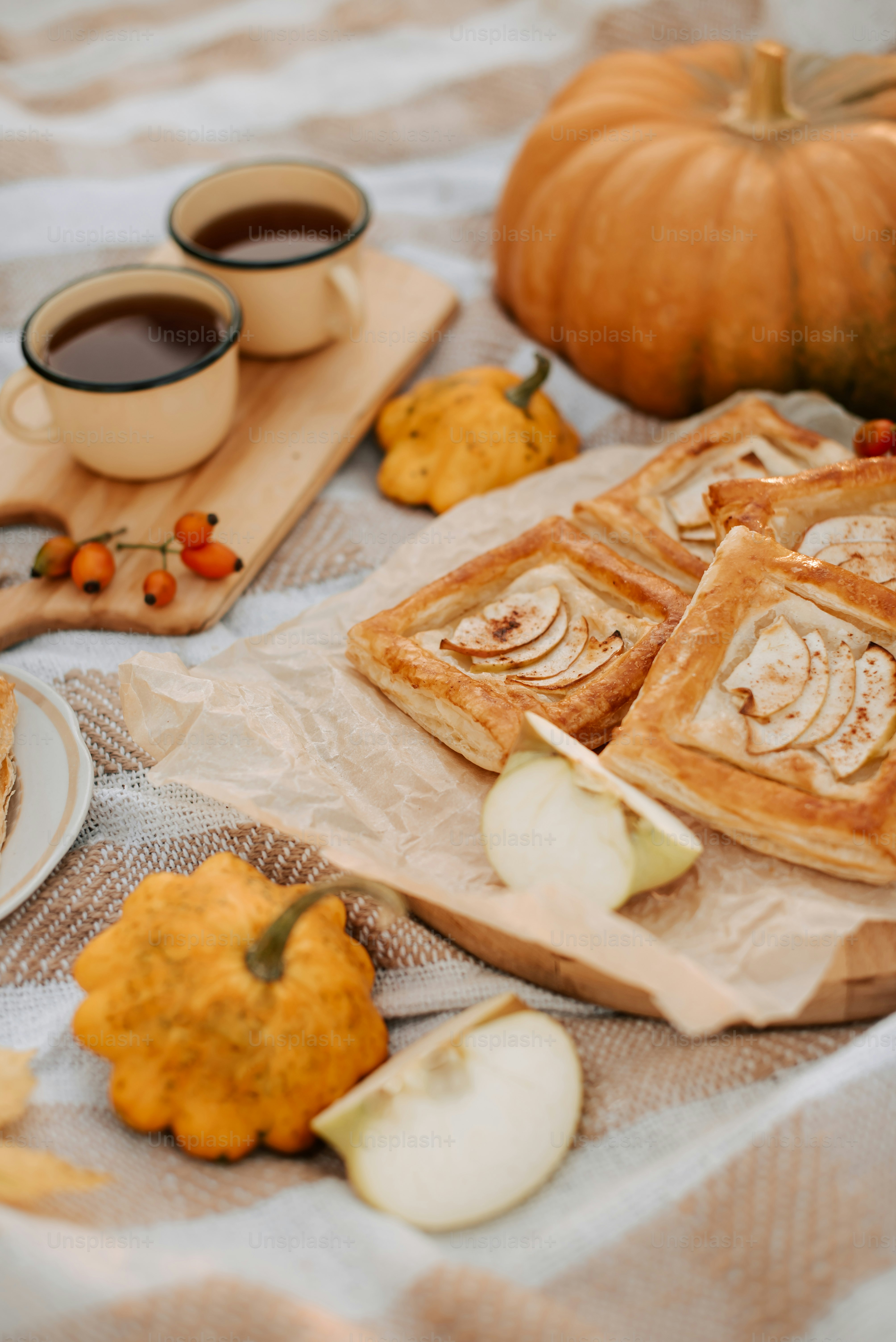 a table topped with plates of food and a cup of coffee