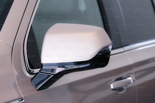 a side view mirror on the side of a car