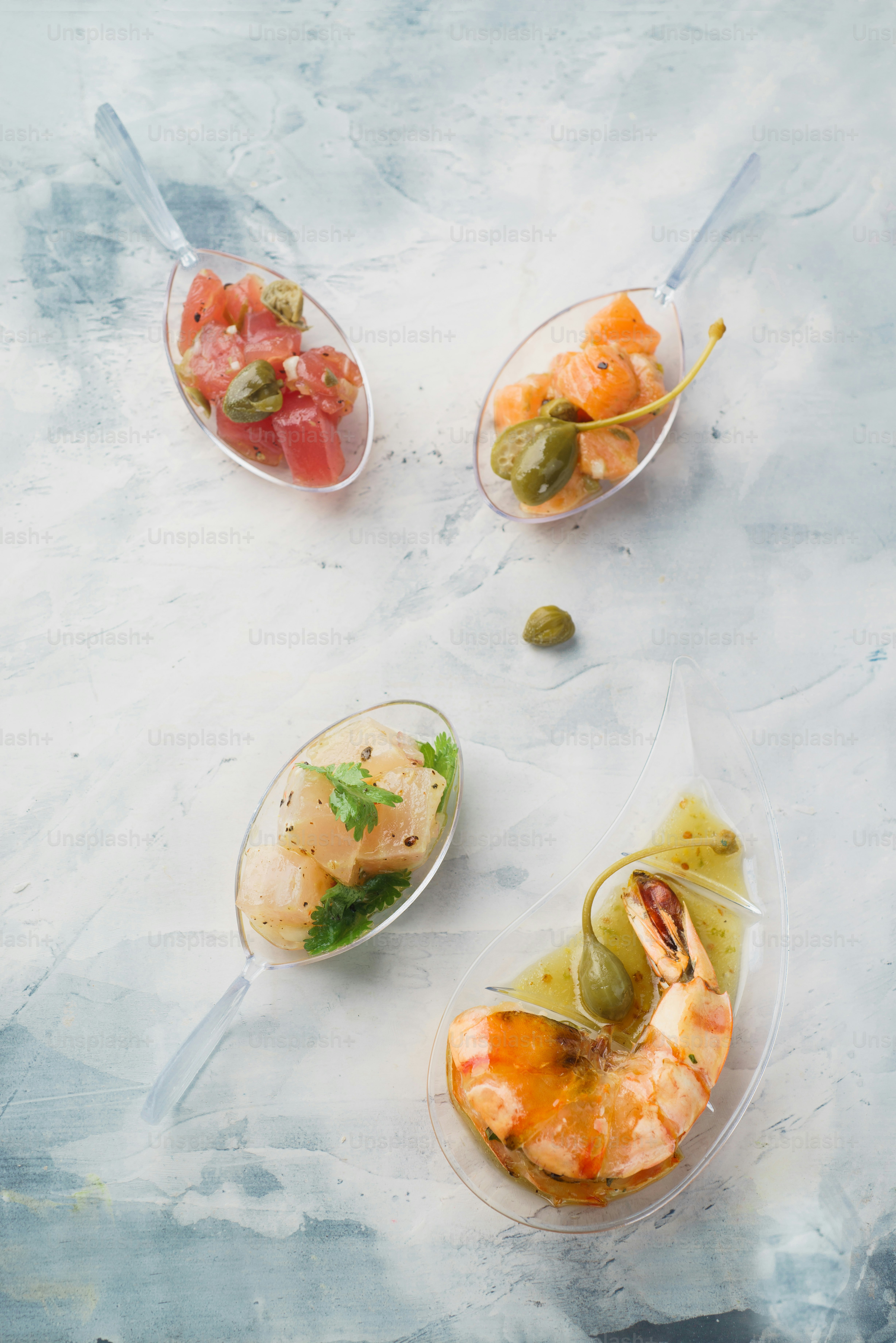 three plastic containers filled with different types of food