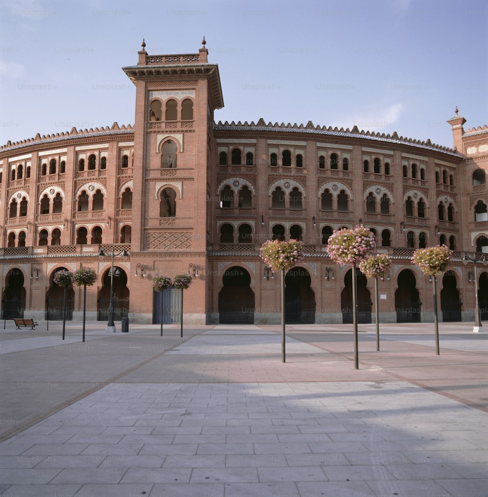 a large brick building with a clock tower